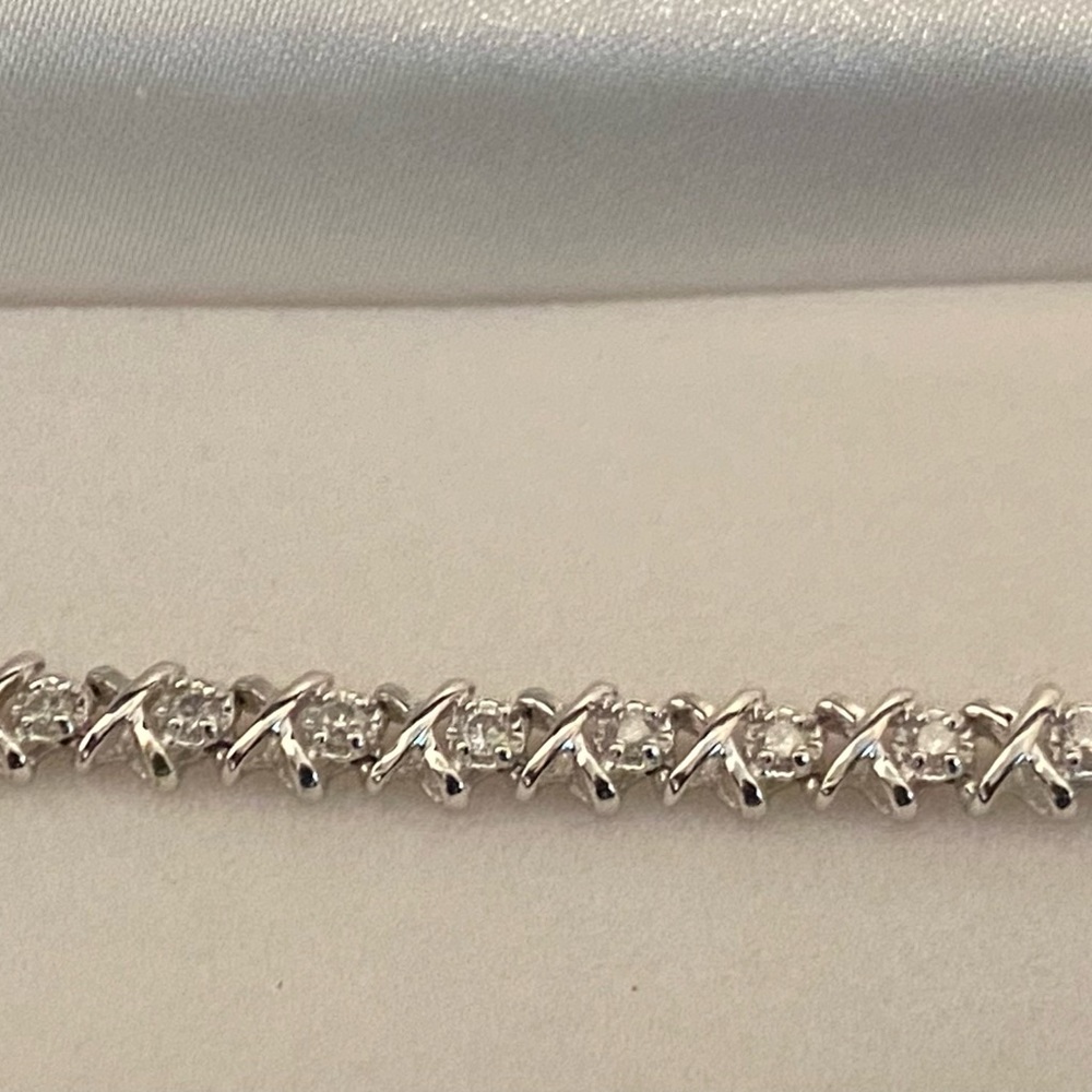 ICE CZ Tennis Style Bracelet, stylish piece to wear with an array of outfits. 7”